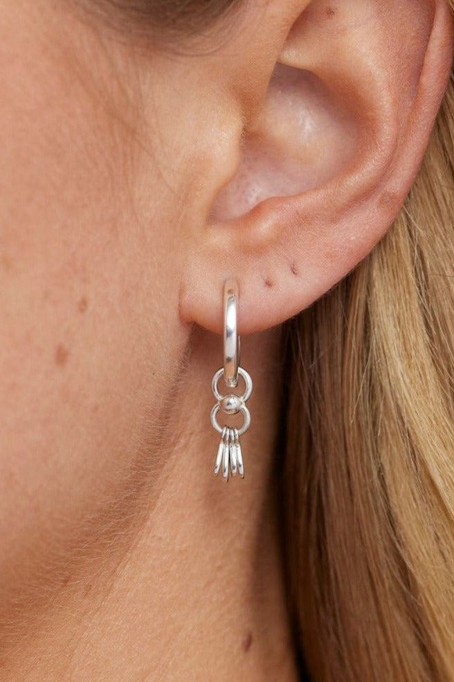 Tassel Silver Charm